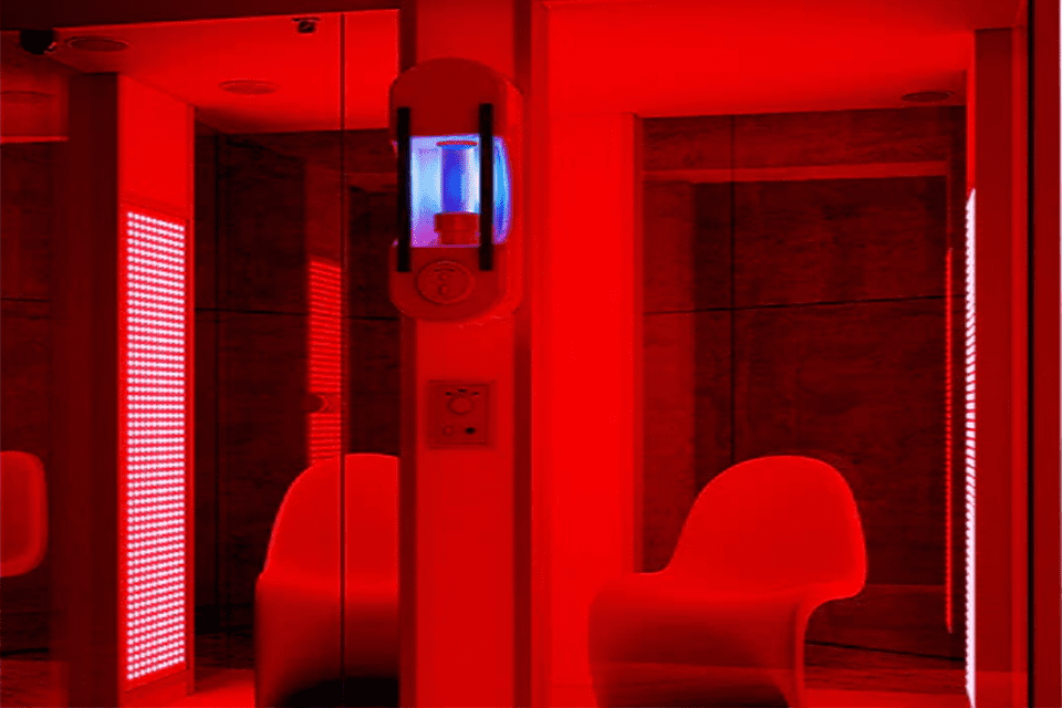 Contemporary room with red led lighting and modern furniture.